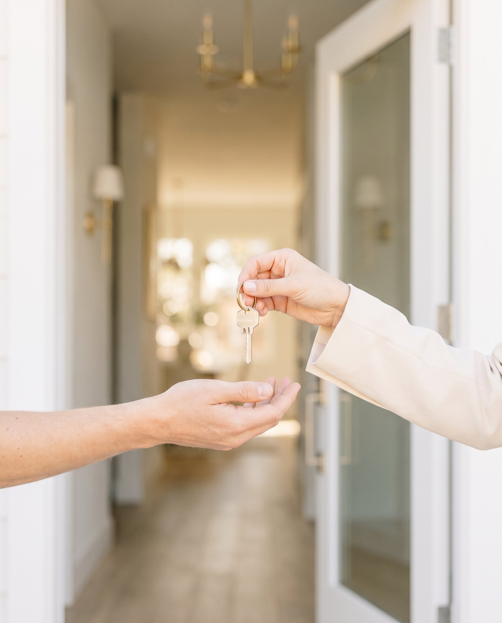 Keys being handed to a new homeowner